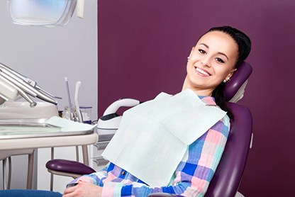 Relaxed patient in dental treatment chair