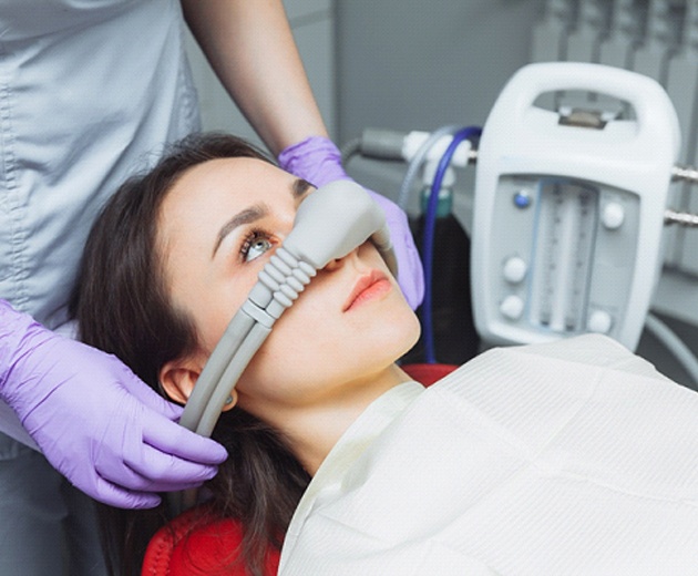 Woman receiving nitrous oxide sedation dentistry in Reston