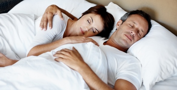 Man and woman sleeping soundly