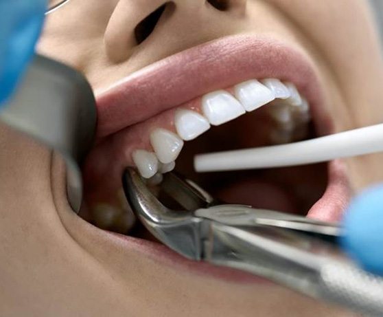 Close-up of smiling man in dental treatment chair