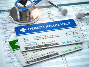 Medical insurance card on top of dental insurance card